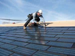 Roofing contractor working on a client's roof